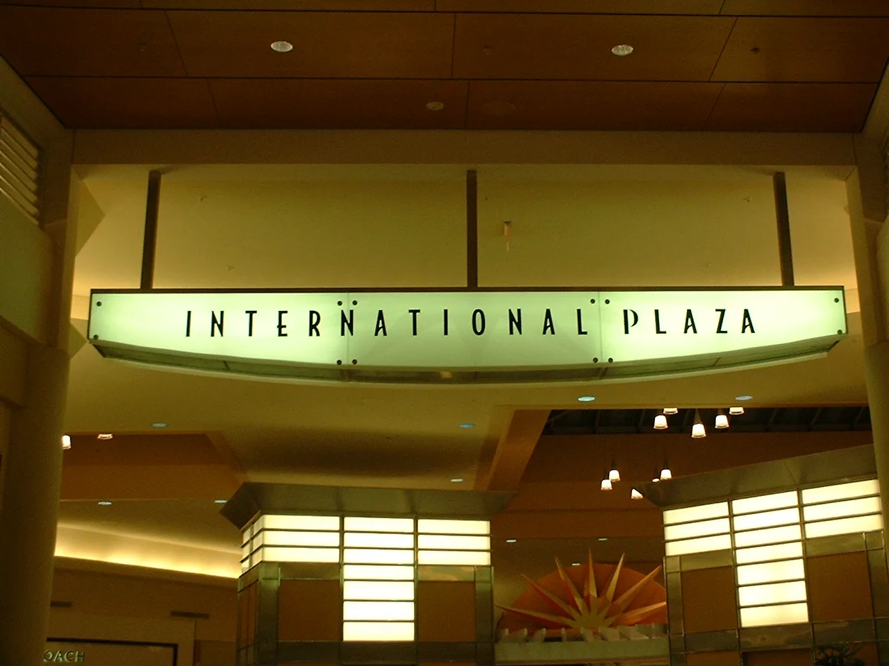 The lighted International Plaza sign inside the mall on North Westshore Boulevard in Tampa.