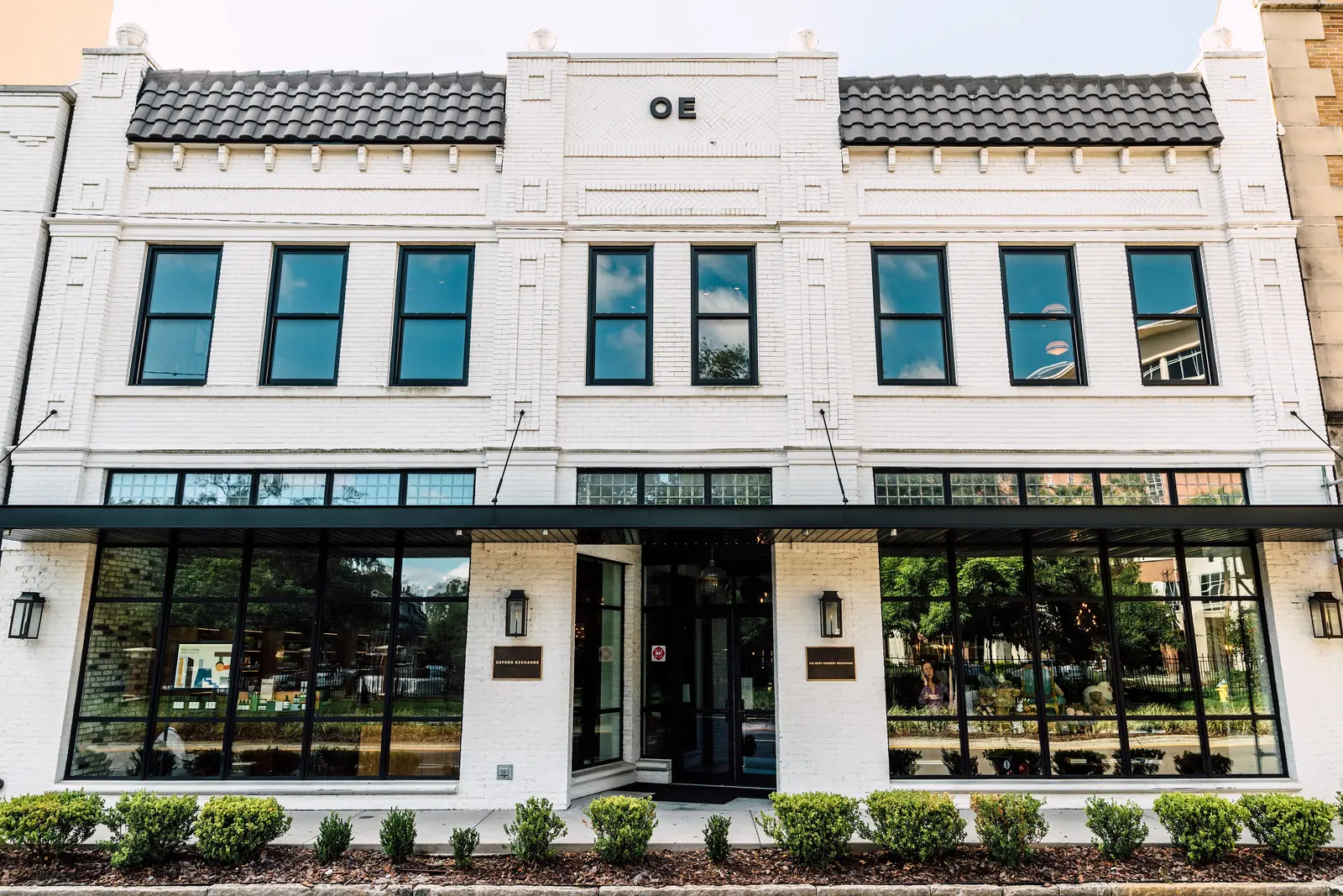 The white brick front of the Oxford Exchange on West Kennedy Boulevard in Tampa.