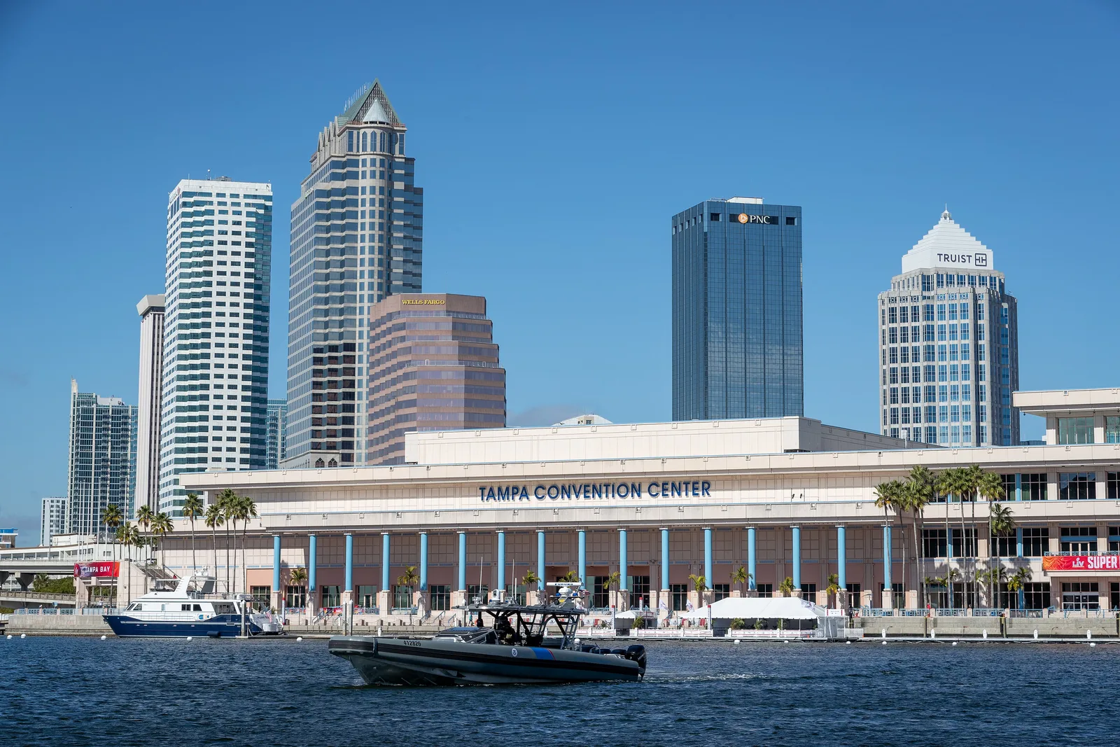 The Tampa Convention Center on the downtown waterfront, with the city's office towers behind it.