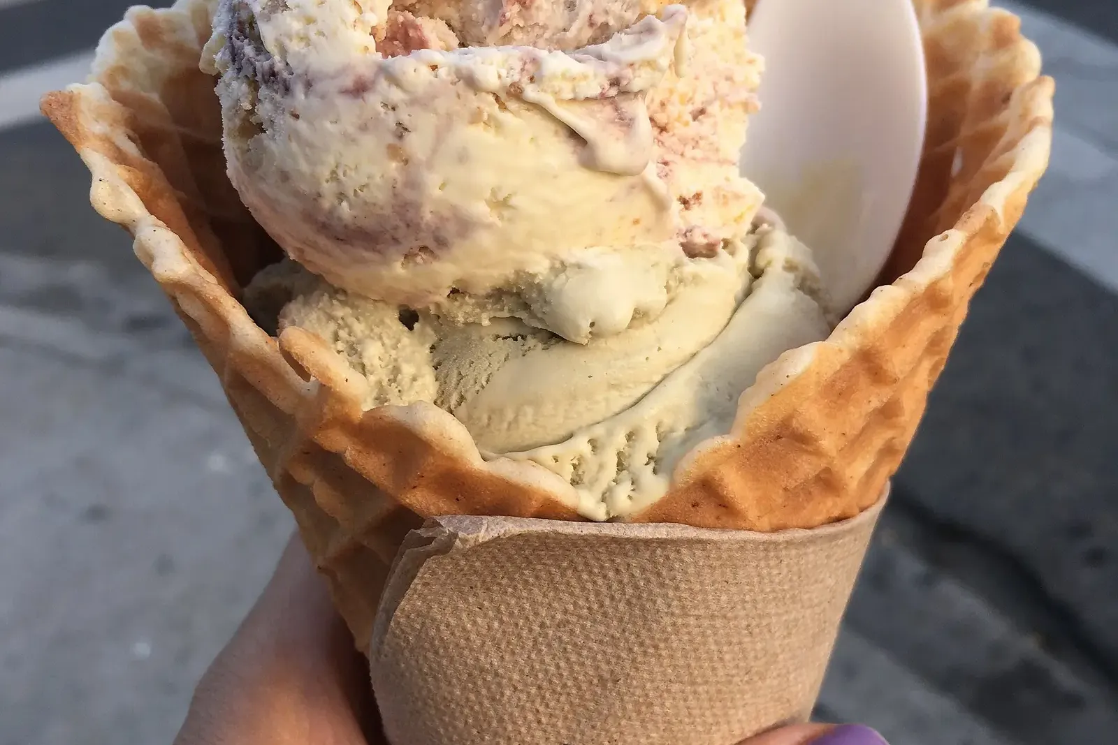 Two scoops of ice cream in a waffle cone. The photo was not taken at a Tampa shop.