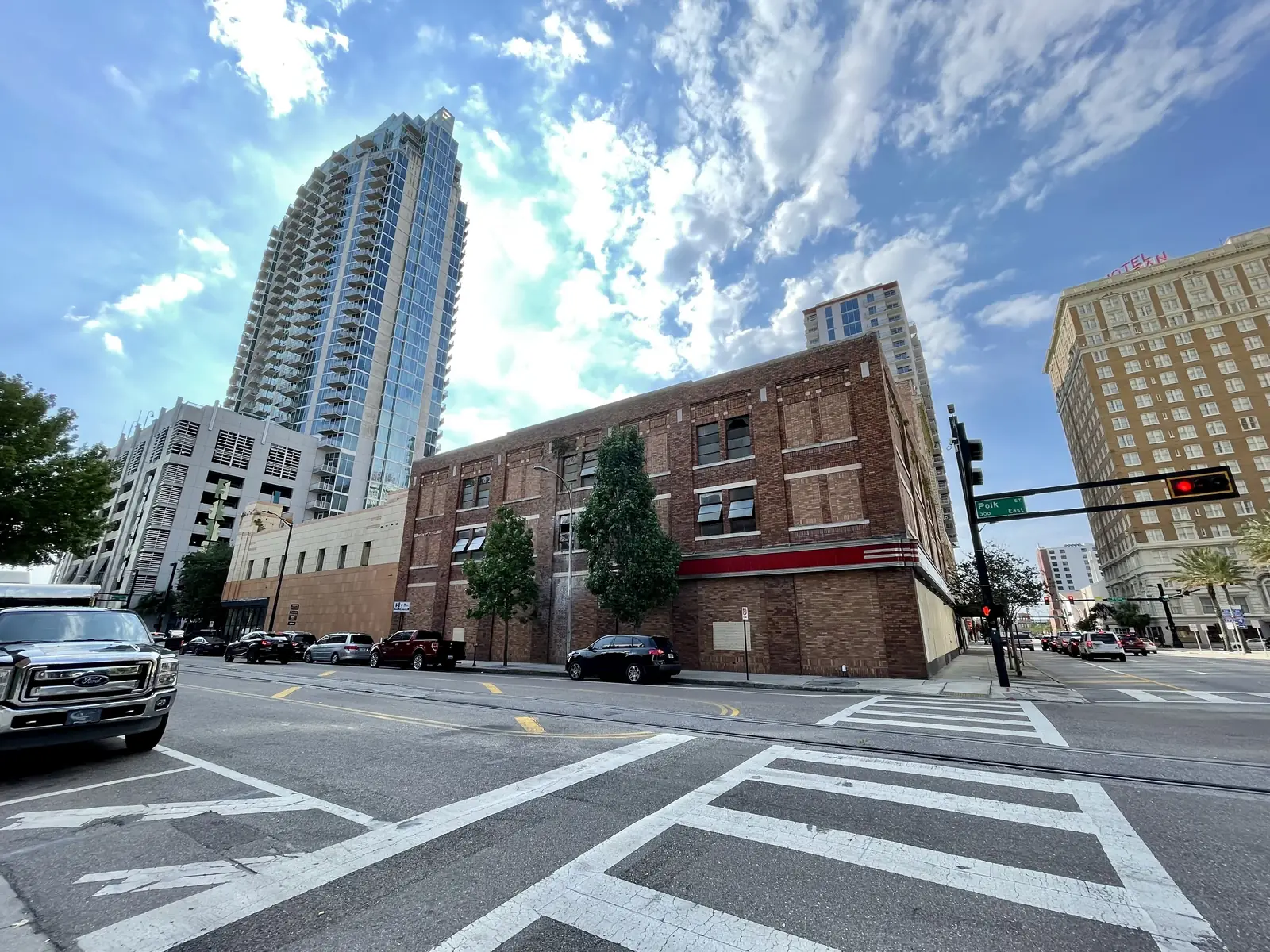 The Kress and Woolworth buildings at Franklin and Polk streets in downtown Tampa, with downtown towers behind.