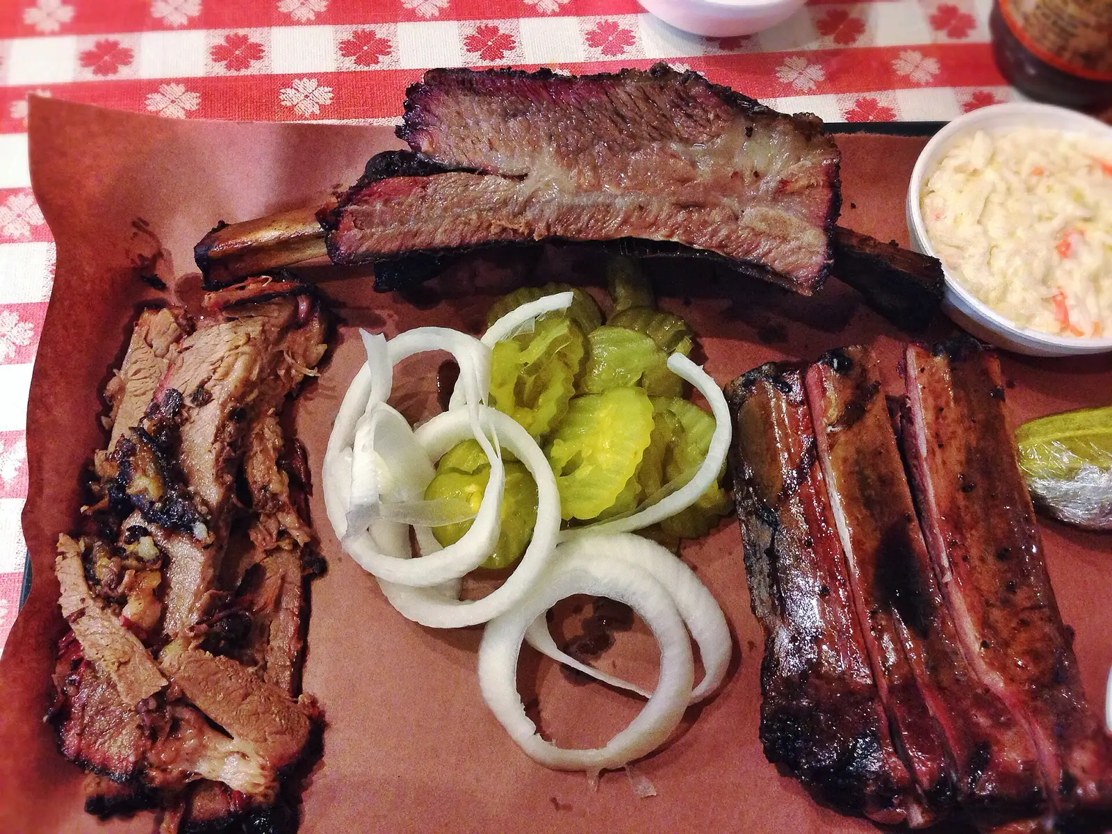 Brisket, ribs and a beef rib on butcher paper at a Texas barbecue restaurant. The photo was not taken in Tampa.